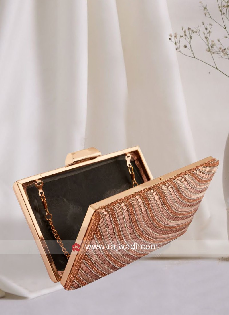 Designer rose gold deals clutch bag